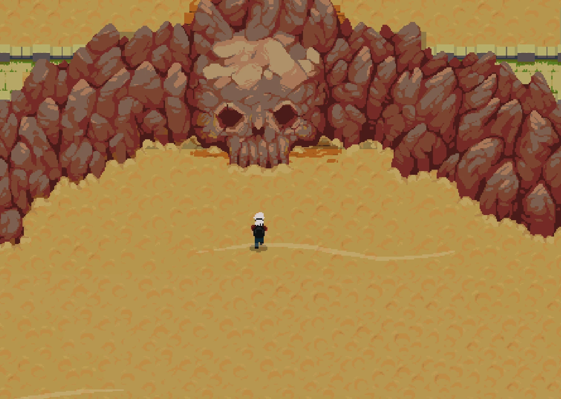 The protagonist stands before an ancient skull-shaped stone door
